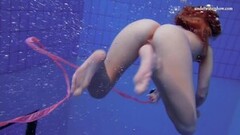 Naughty Katka Matrosova swimming naked alone in the pool Thumb